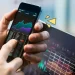 5 APLIKASI INVESTASI TERBAIK BUAT PEMULA: BIAR DUIT KERJA BUAT KAMU!